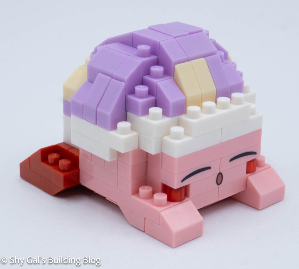 Independent reviewer's completed Kirby Sleep nanoblock model showing the slope-built hat